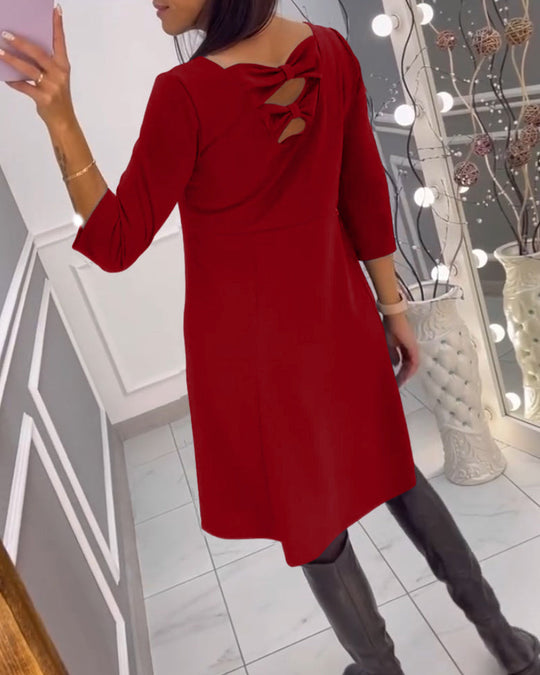 Robe unie avec nœud au dos