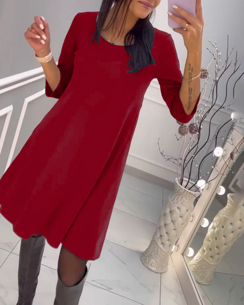 Robe unie avec nœud au dos