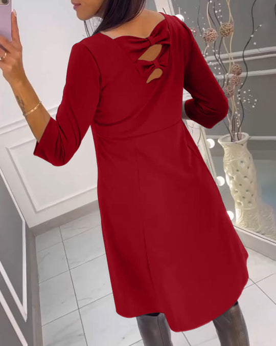 Robe unie avec nœud au dos