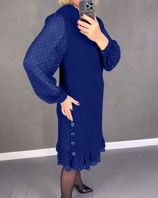 Robe élégante à pois et manches longues