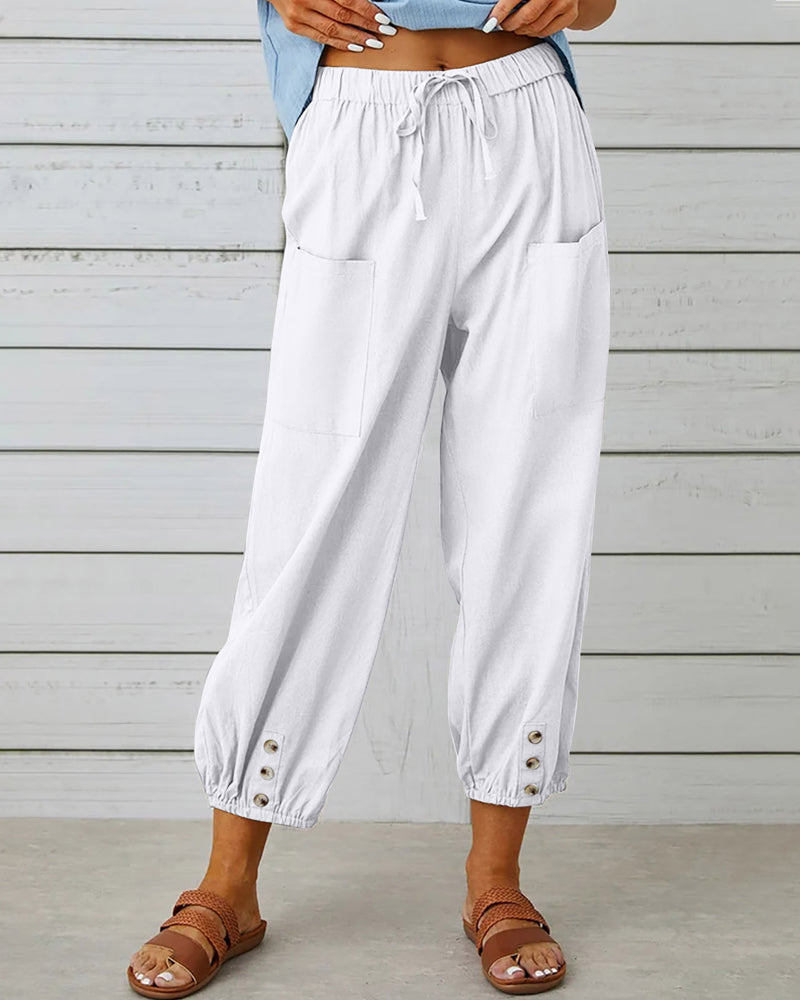 Pantalon taille haute bouton neuf points