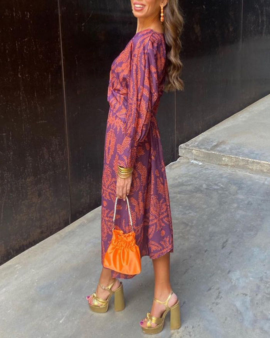 Robe élégante à manches longues et col en V imprimé vintage