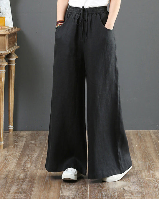 Pantalon large taille haute de couleur unie