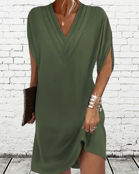 Robe élégante à manches fendues de couleur unie