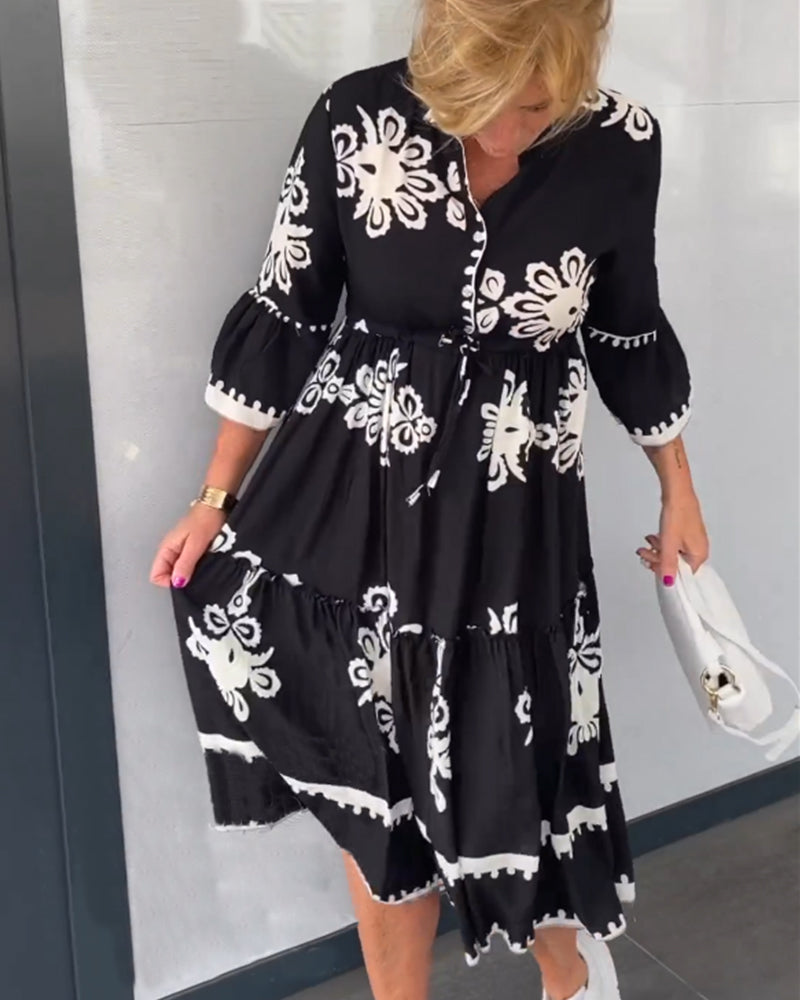 Robe à imprimé floral et manches 3/4