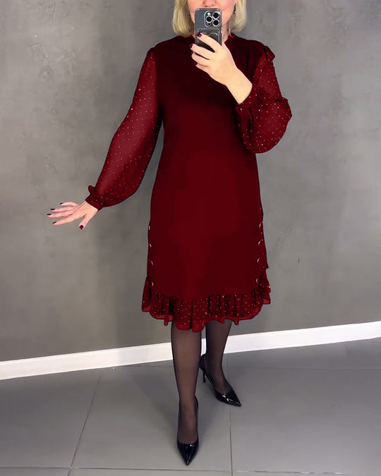 Robe élégante à pois et manches longues