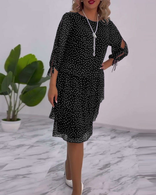 Robe élégante superposée à imprimé pois