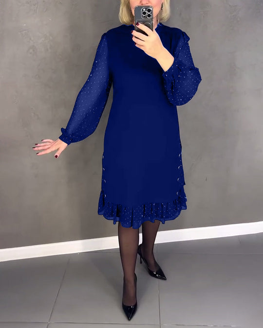 Robe élégante à pois et manches longues