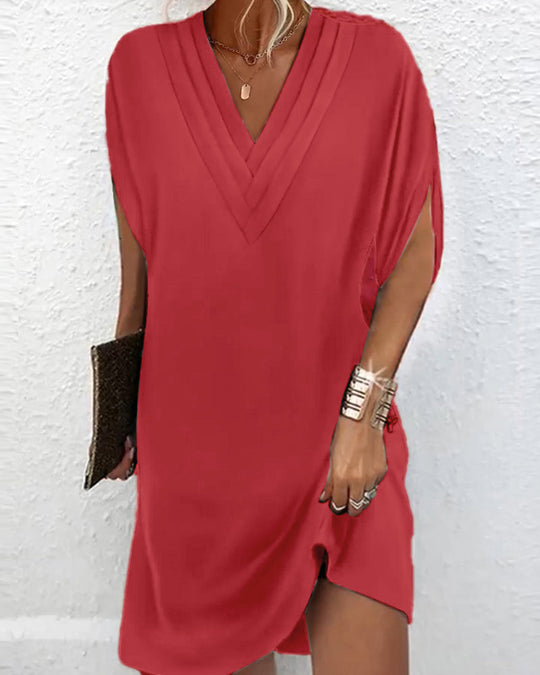 Robe élégante à manches fendues de couleur unie