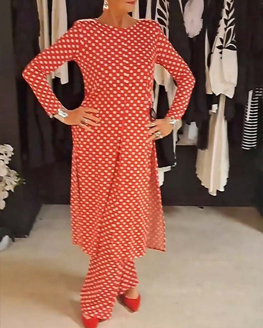 Costume élégant fendu à pois