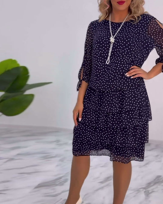 Robe élégante superposée à imprimé pois