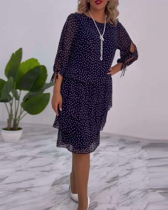 Robe élégante superposée à imprimé pois