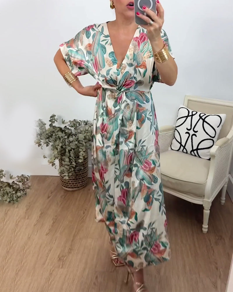 Robe élégante torsadée à col en V et imprimé botanique