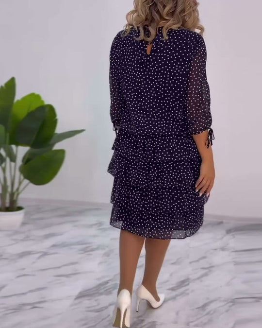 Robe élégante superposée à imprimé pois