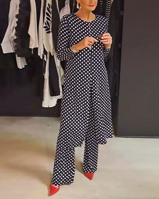 Costume élégant fendu à pois