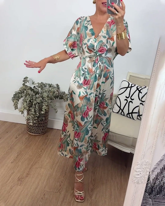 Robe élégante torsadée à col en V et imprimé botanique