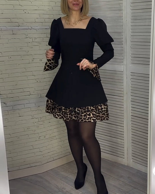 Robe élégante à manches bouffantes et imprimé léopard