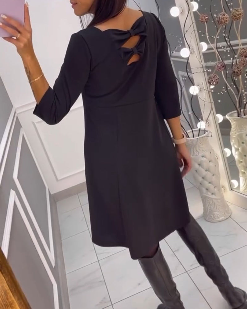 Robe unie avec nœud au dos